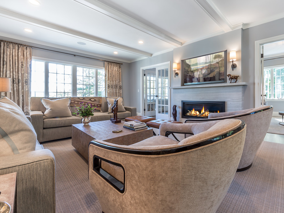Photo of a large traditional formal enclosed living room in Boston with a standard fireplace and coffered.