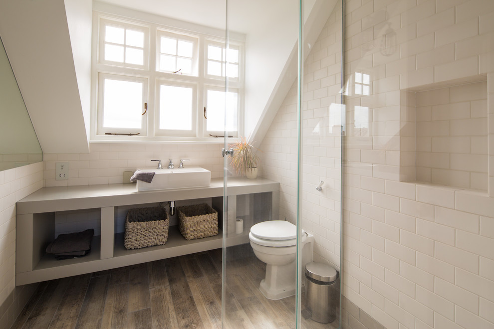 Design ideas for a transitional bathroom in London with a vessel sink.