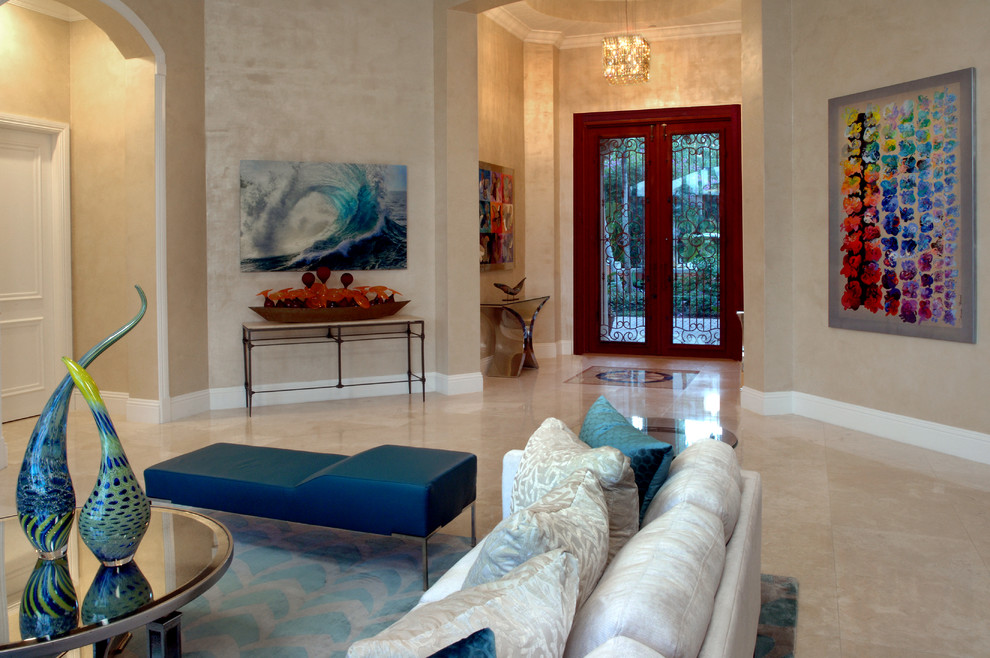 Inspiration for a mid-sized transitional marble floor foyer remodel in Miami with beige walls and a glass front door