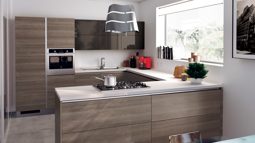 Small modern u-shaped eat-in kitchen in Melbourne with a double-bowl sink, raised-panel cabinets, medium wood cabinets, quartz benchtops, white splashback, stainless steel appliances and a peninsula.