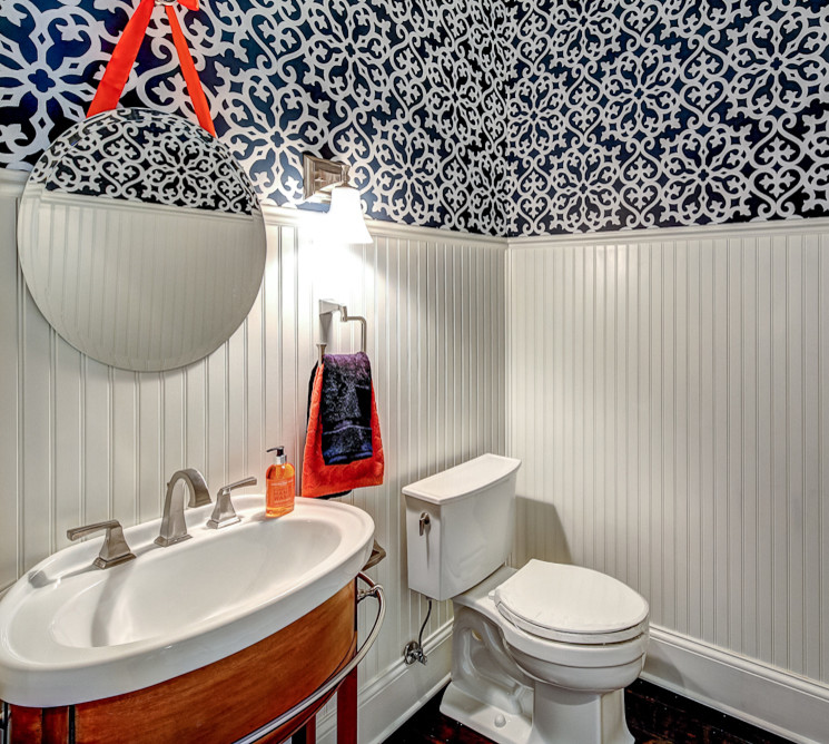 Inspiration for a traditional powder room in Louisville.