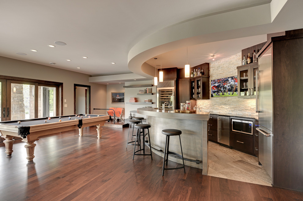 Photo of a transitional home bar in Minneapolis with beige floor.