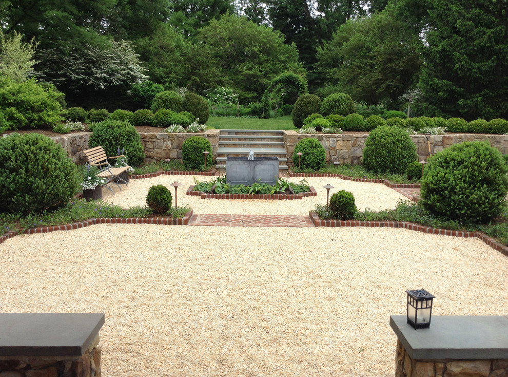 Design ideas for a mid-sized traditional backyard gravel formal garden in DC Metro.