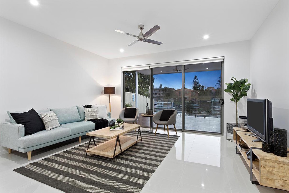 Mid-sized contemporary open concept living room in Gold Coast - Tweed with white walls, ceramic floors and white floor.