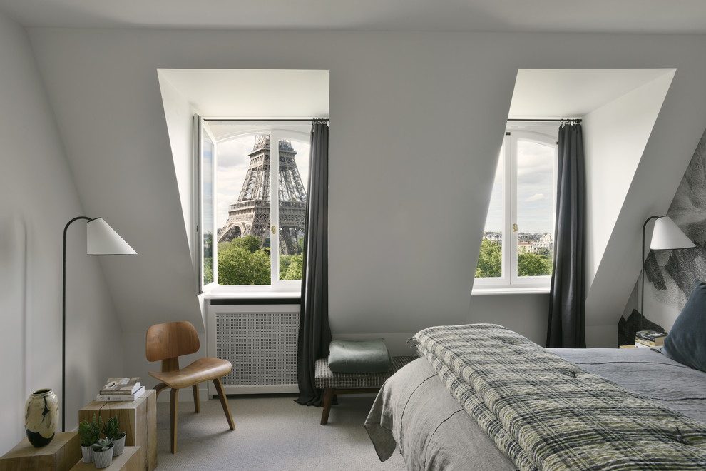 Design ideas for a large contemporary master bedroom in Paris with white walls, carpet and beige floor.
