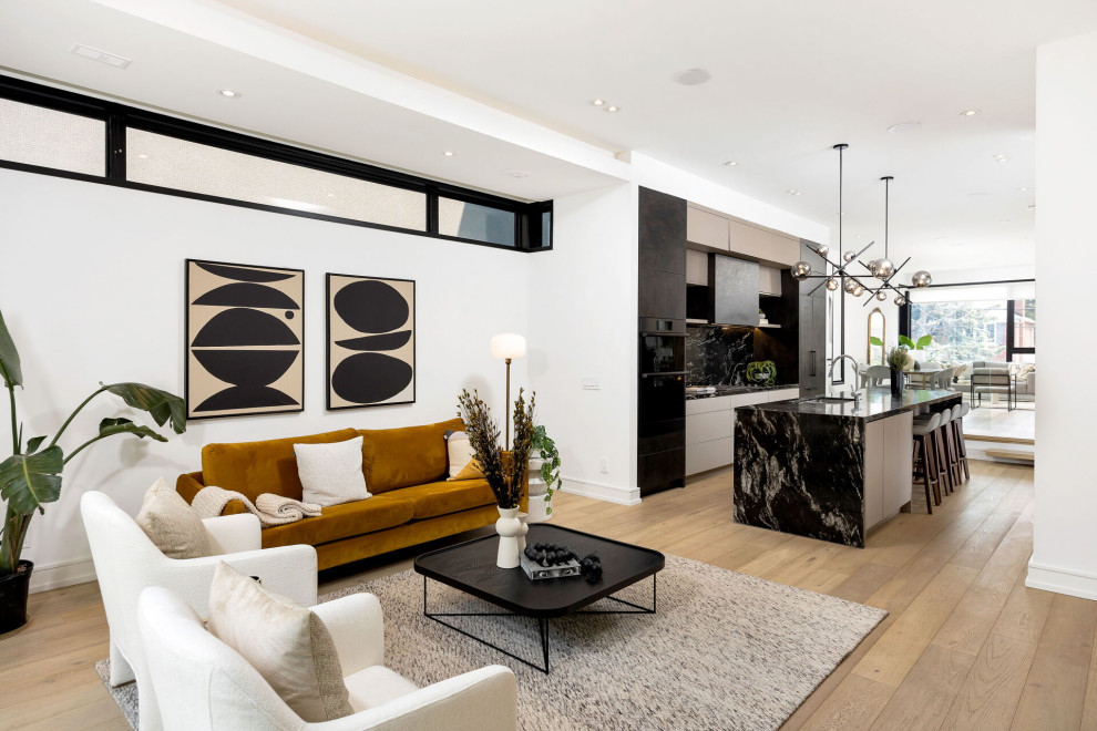 Идея дизайна: открытая гостиная комната в современном стиле с белыми стенами, паркетным полом среднего тона и коричневым полом