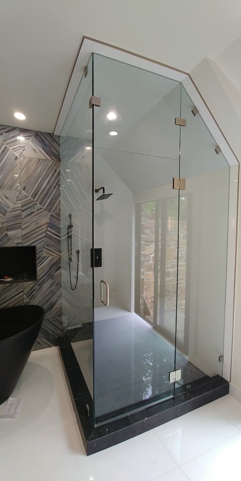 Bathroom - transitional master bathroom idea with a hinged shower door