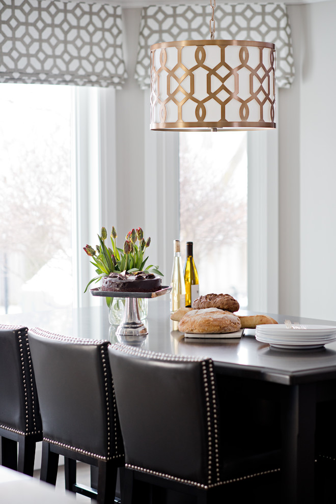 Inspiration for a large transitional l-shaped dark wood floor open concept kitchen remodel in Toronto with an undermount sink, shaker cabinets, white cabinets, granite countertops, gray backsplash, glass tile backsplash, stainless steel appliances and two islands
