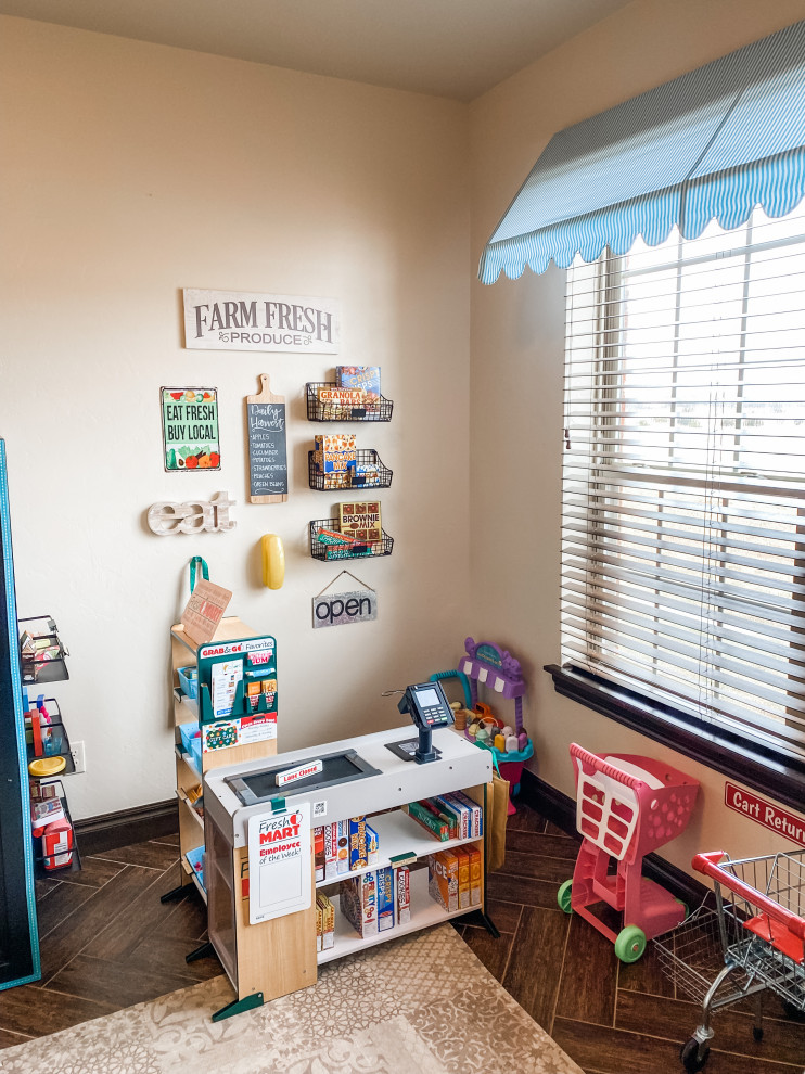 Expansive eclectic gender-neutral kids' playroom in Oklahoma City with multi-coloured walls, carpet and multi-coloured floor.