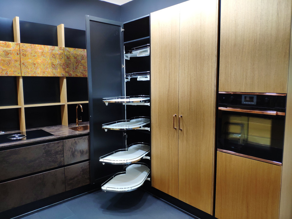 Photo of a medium sized contemporary l-shaped enclosed kitchen in Moscow with a submerged sink, flat-panel cabinets, grey cabinets, wood worktops, black splashback, wood splashback, black appliances, no island and grey worktops.