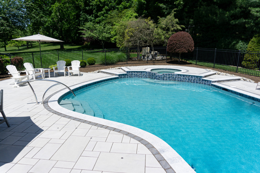 Holmdel, NJ: Paver Patio Installation Surrounding Inground Pool