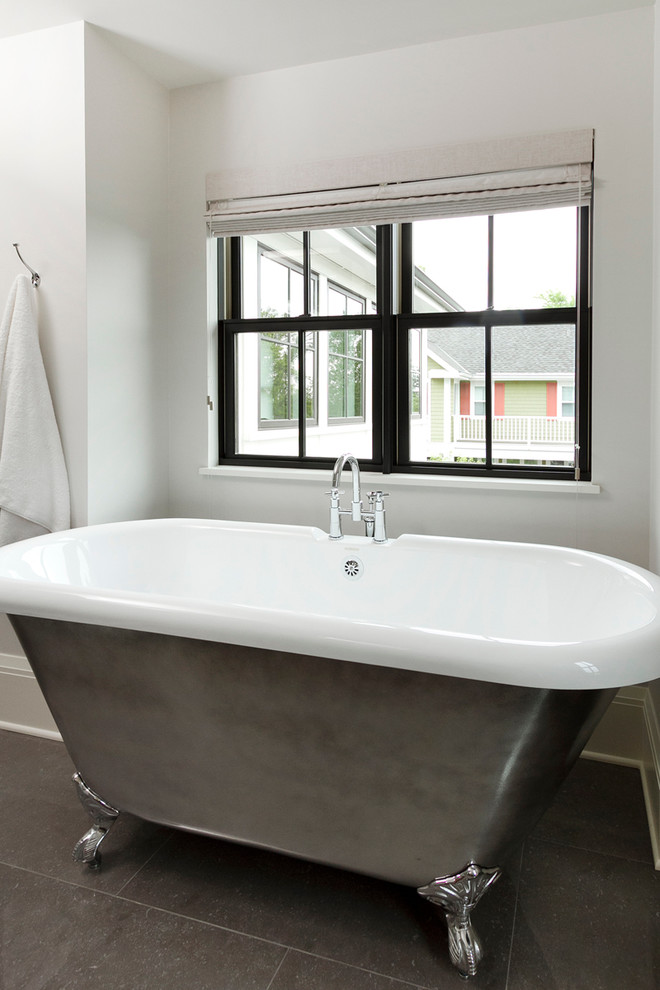 Design ideas for a transitional bathroom in Minneapolis with a claw-foot tub.