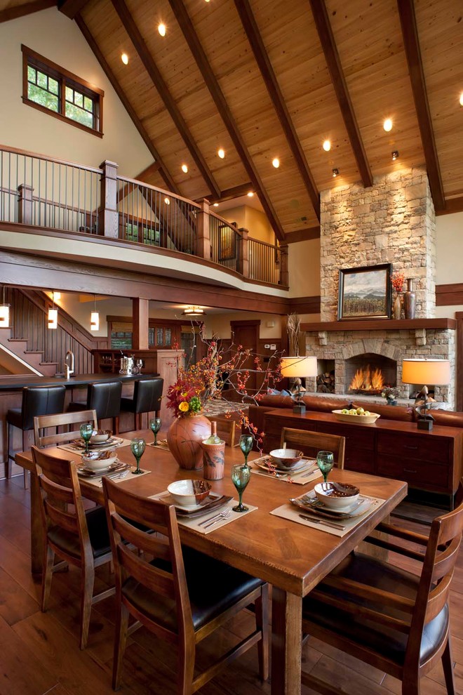 Photo of a traditional open plan dining in Albuquerque with dark hardwood floors.