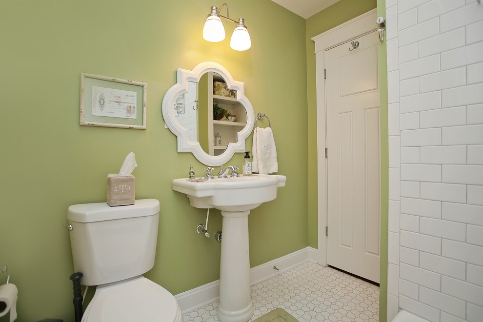 Mid-sized arts and crafts bathroom in Charlotte with white tile, subway tile and green walls.
