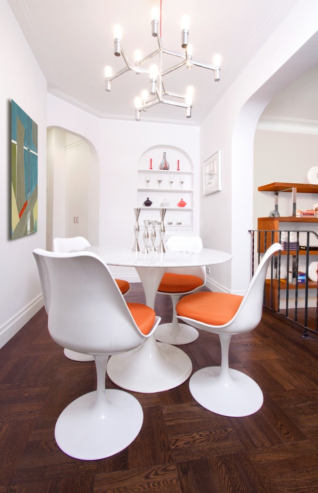 Mid-sized contemporary separate dining room in New York with white walls, dark hardwood floors and no fireplace.