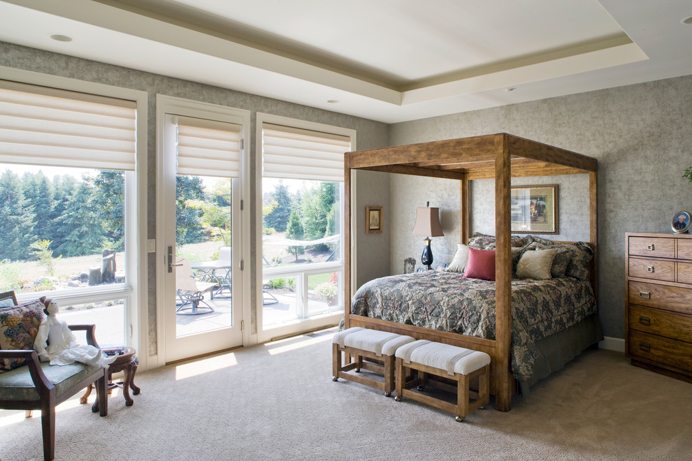 Photo of a traditional bedroom in Portland with grey walls, carpet and no fireplace.
