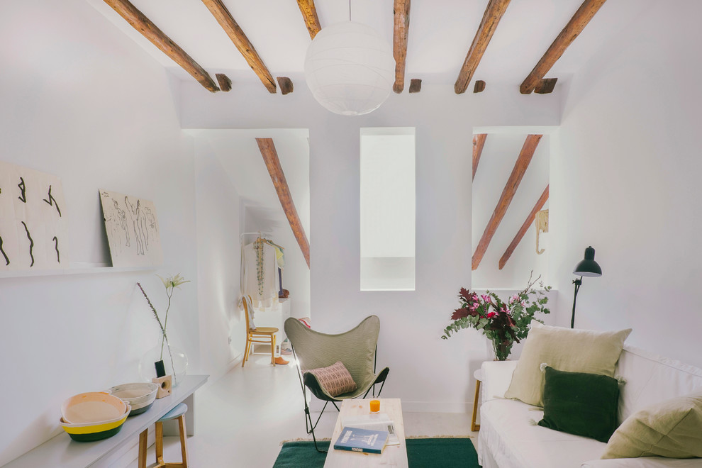 Inspiration for a small scandinavian enclosed living room in Madrid with white walls and no fireplace.