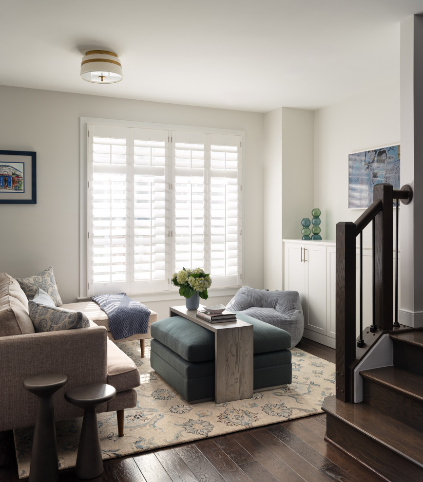 Living room - small transitional open concept medium tone wood floor and brown floor living room idea in DC Metro with white walls and a wall-mounted tv