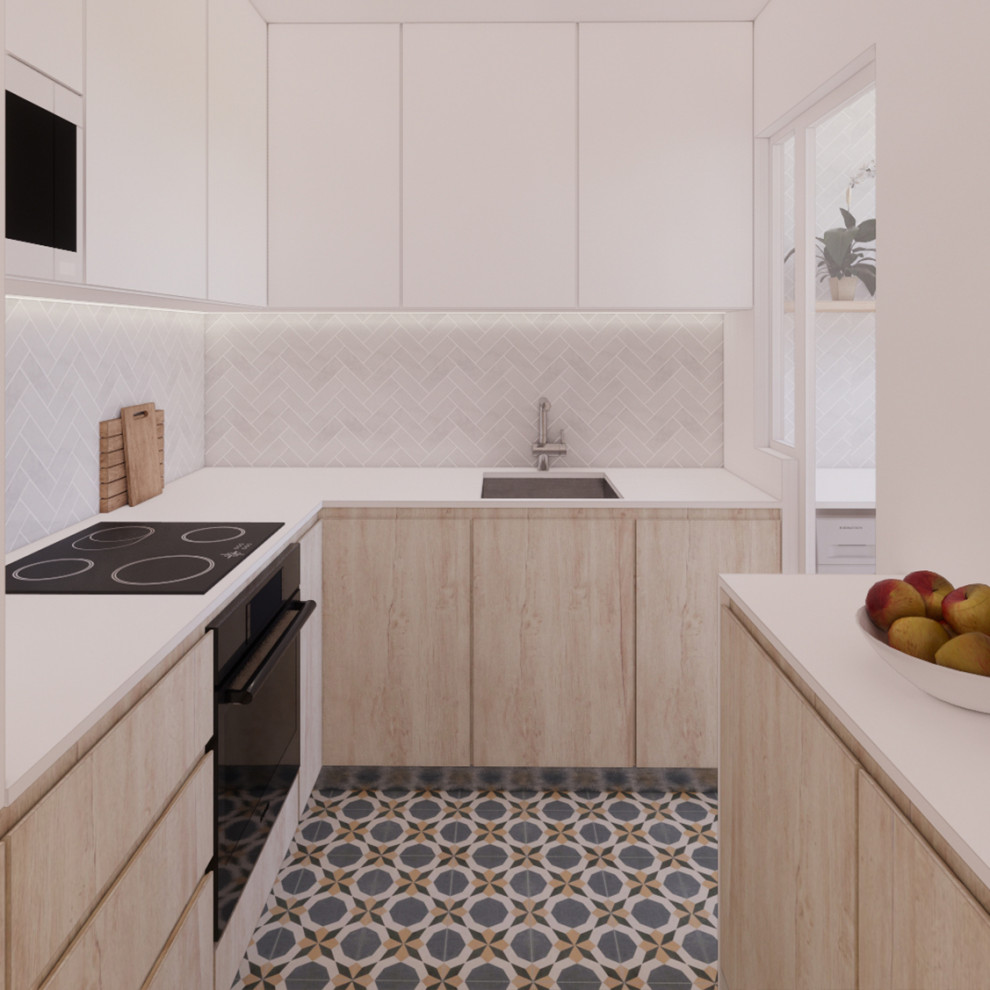 Example of a small trendy u-shaped ceramic tile and multicolored floor enclosed kitchen design in Barcelona with an undermount sink, flat-panel cabinets, light wood cabinets, quartz countertops, white backsplash, ceramic backsplash, paneled appliances and white countertops