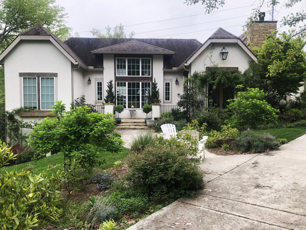 Large french country exterior home photo in Other