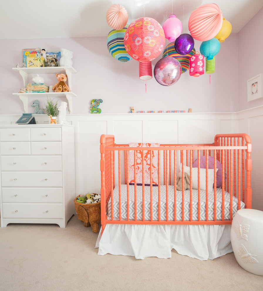 Mid-sized transitional nursery in Calgary with purple walls, carpet and beige floor for girls.