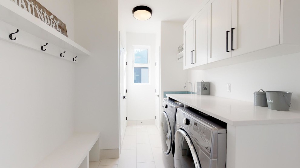 Inspiration for a transitional laundry room in Vancouver.