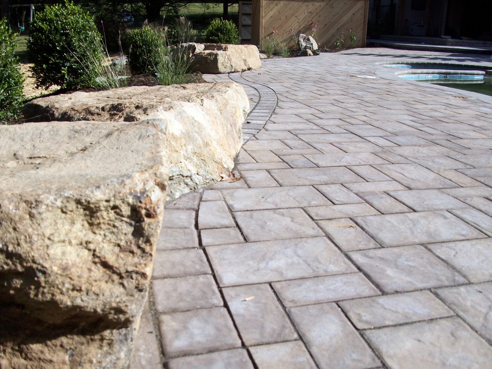 Design ideas for a large rustic full sun backyard concrete paver landscaping in Baltimore.