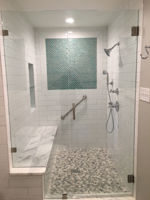 Aging In Place - Luxury Senior Living Bathroom Remodeling - zero curb entry, heated bench w/ toiletry cutouts, sturdy rail to help you stand up and sit down, a shower head that stretches to the bench