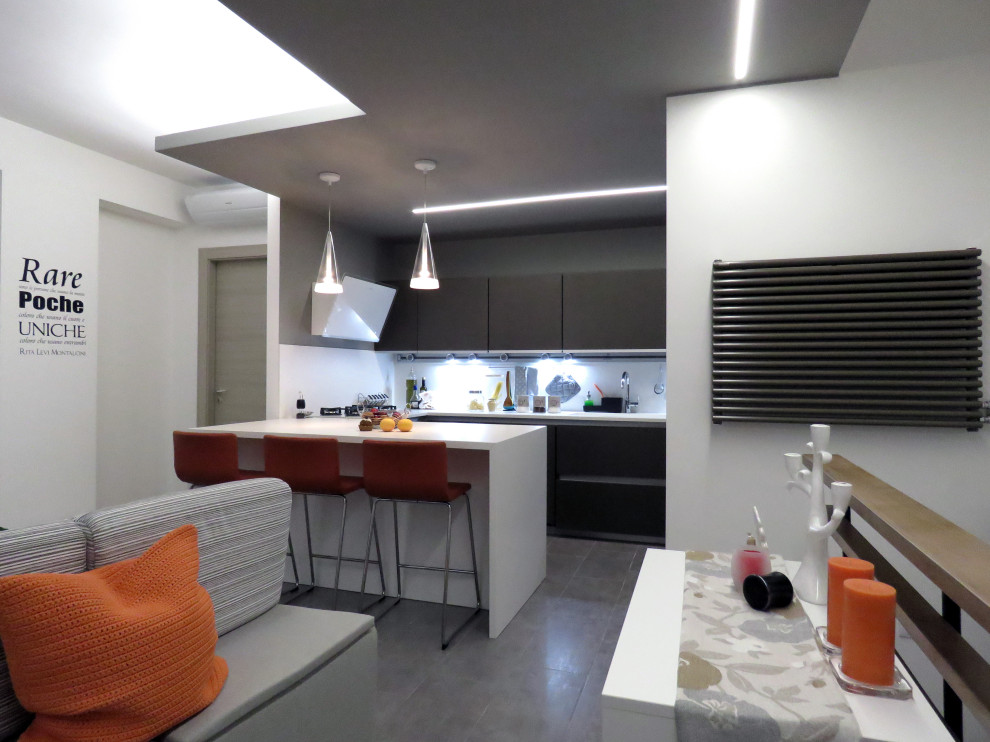 Photo of a small contemporary u-shaped open plan kitchen in Catania-Palermo with an integrated sink, flat-panel cabinets, brown cabinets, white splashback, porcelain splashback, stainless steel appliances, porcelain floors, with island, brown floor and white benchtop.