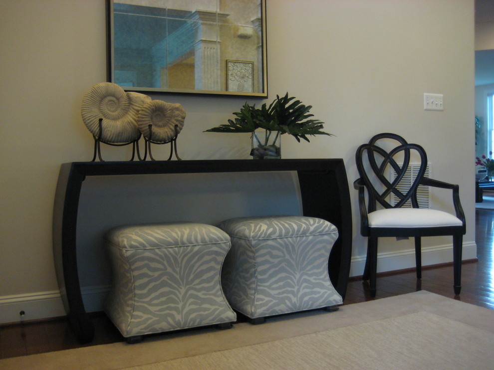 Large transitional medium tone wood floor foyer photo in DC Metro with beige walls