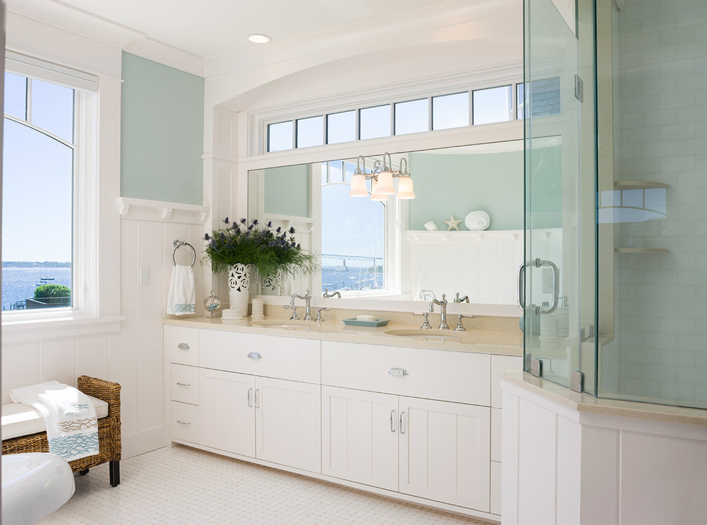 Inspiration for a traditional master bathroom in Providence with an undermount sink, recessed-panel cabinets, white cabinets, white tile, subway tile and blue walls.