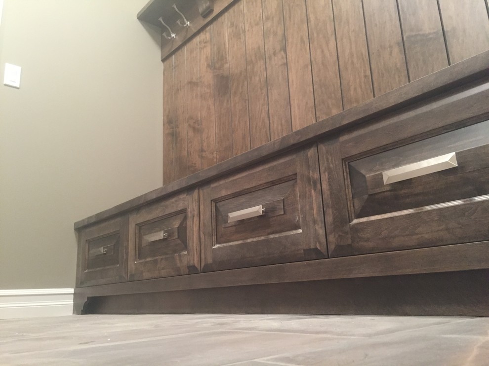 Example of a mid-sized mountain style entryway design in Calgary