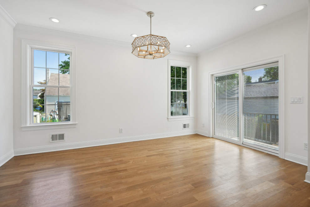 Open floor plan view from the living area looking into the kitchen, showcasing t