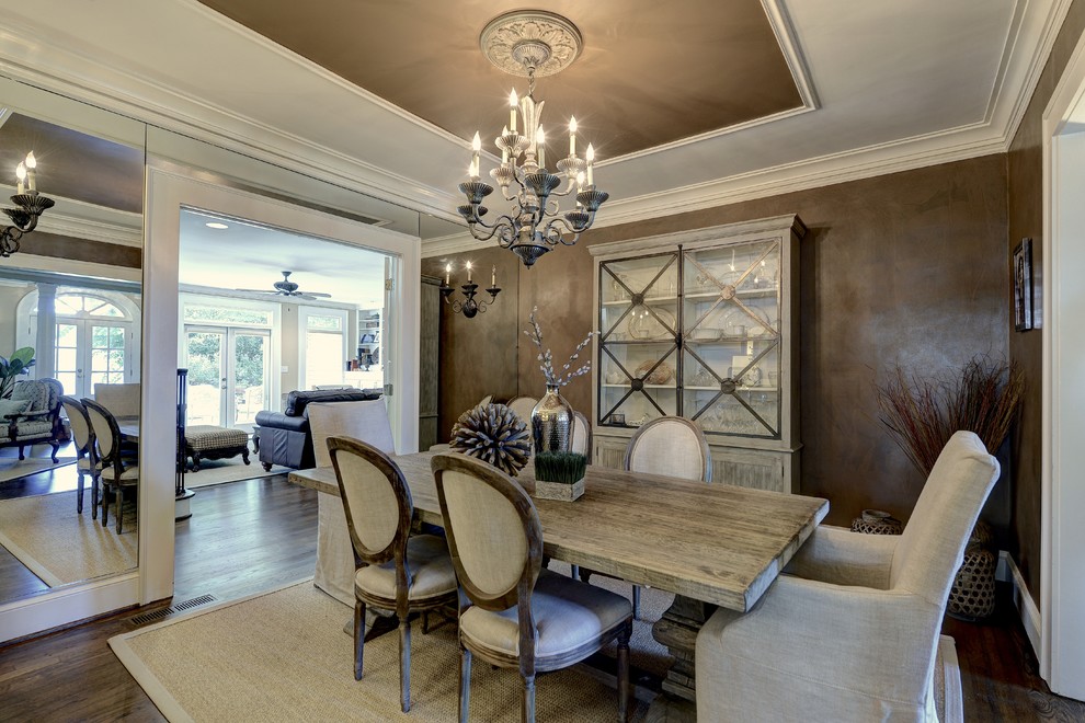Design ideas for a traditional separate dining room in Atlanta with dark hardwood floors, brown walls and brown floor.