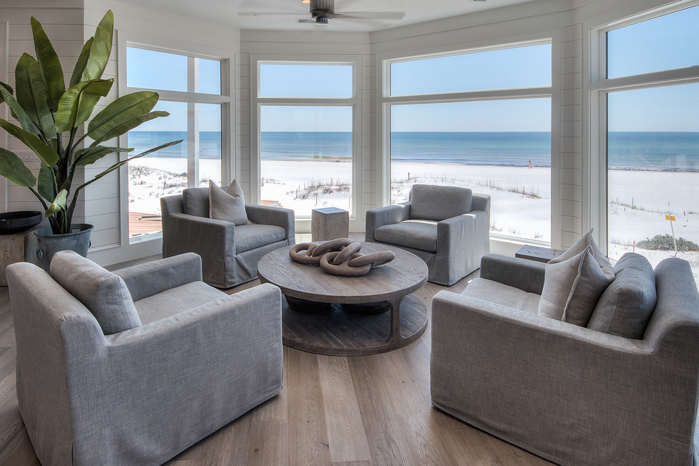 This is an example of a beach style living room in Miami.