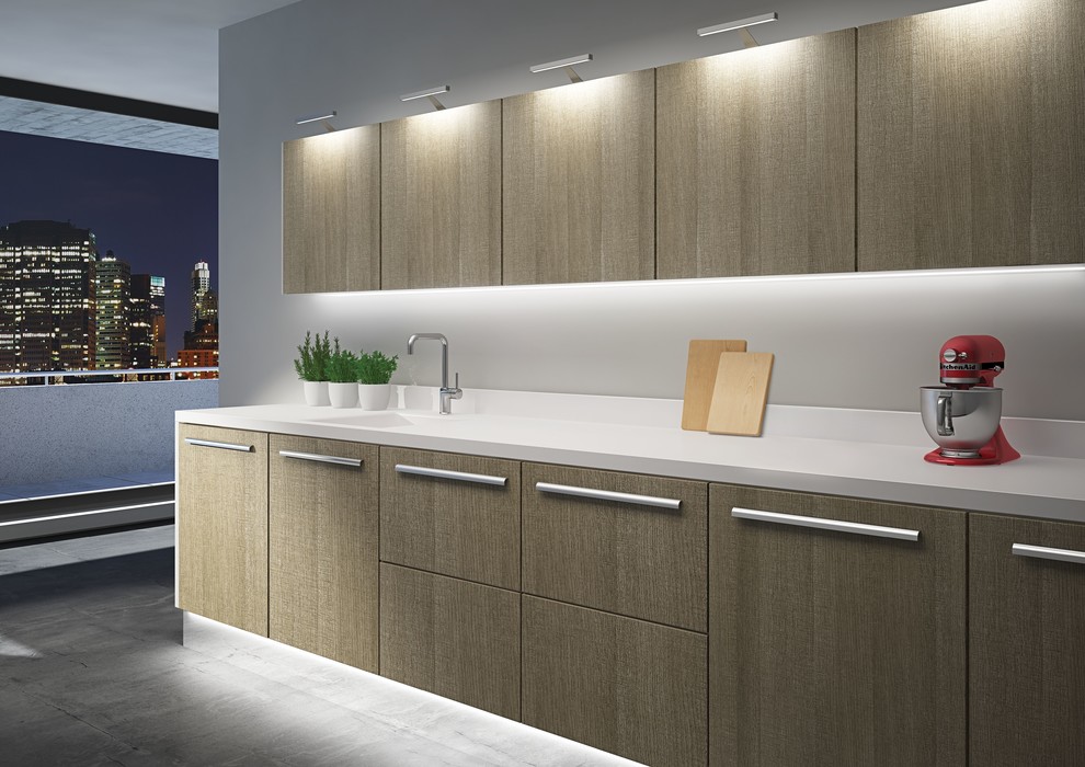 Kitchen - small contemporary single-wall concrete floor and gray floor kitchen idea in Toronto with a single-bowl sink, flat-panel cabinets, medium tone wood cabinets, granite countertops, white backsplash, stainless steel appliances and white countertops
