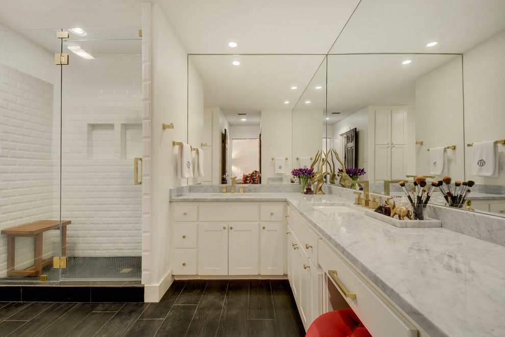 Bathroom - transitional white tile bathroom idea in Austin with white cabinets