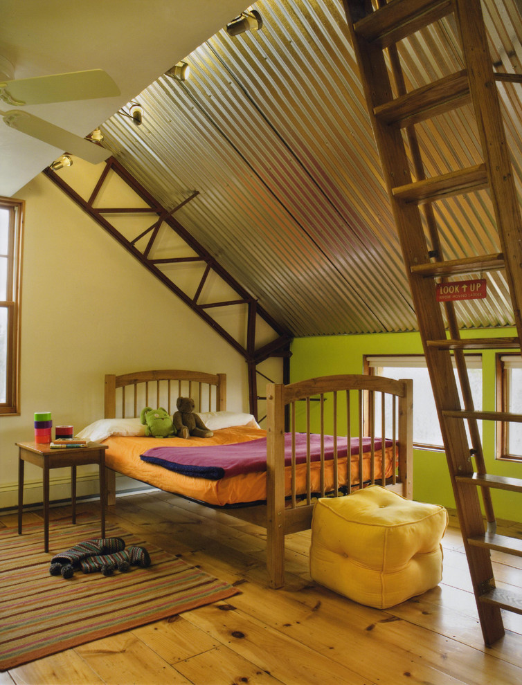 Photo of an industrial kids' bedroom in Boston with multi-coloured walls.
