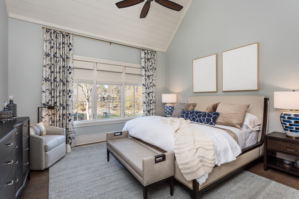 This is an example of a country master bedroom in Other with wallpaper.