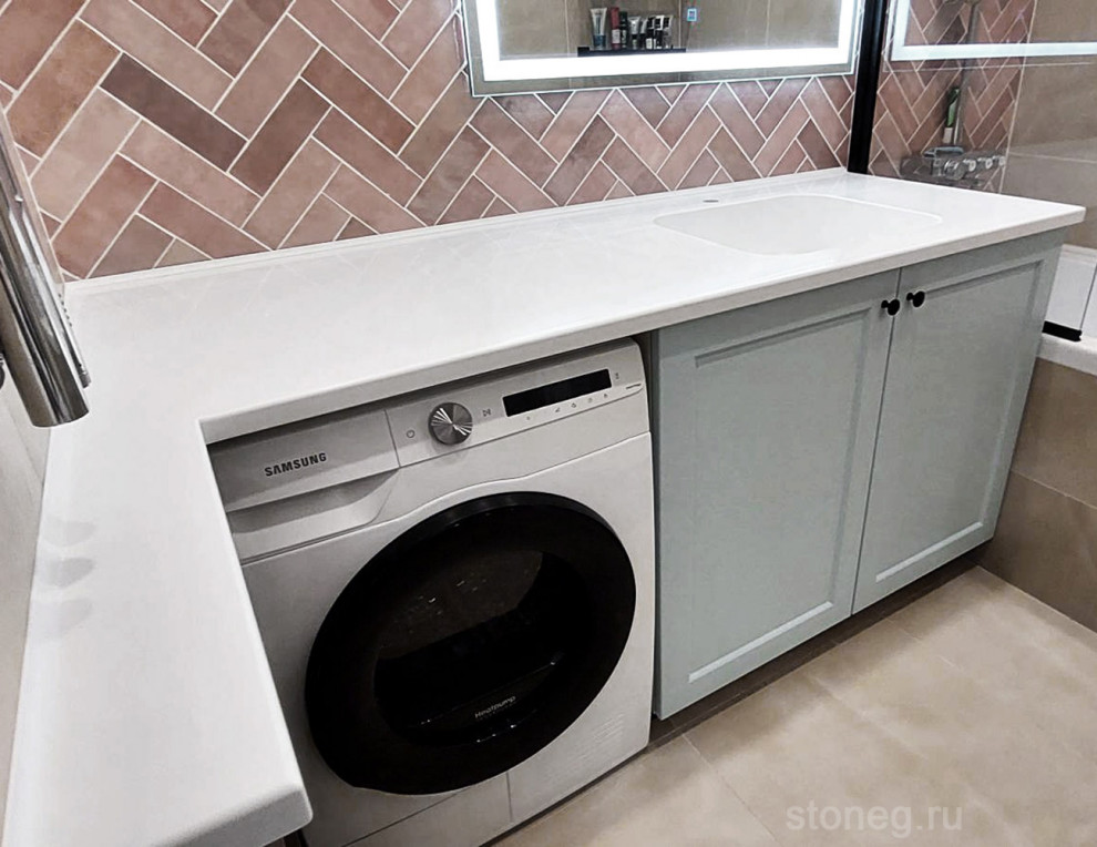 Foto di una lavanderia multiuso design di medie dimensioni con lavello integrato, top in superficie solida, pareti marroni, pavimento grigio e top bianco