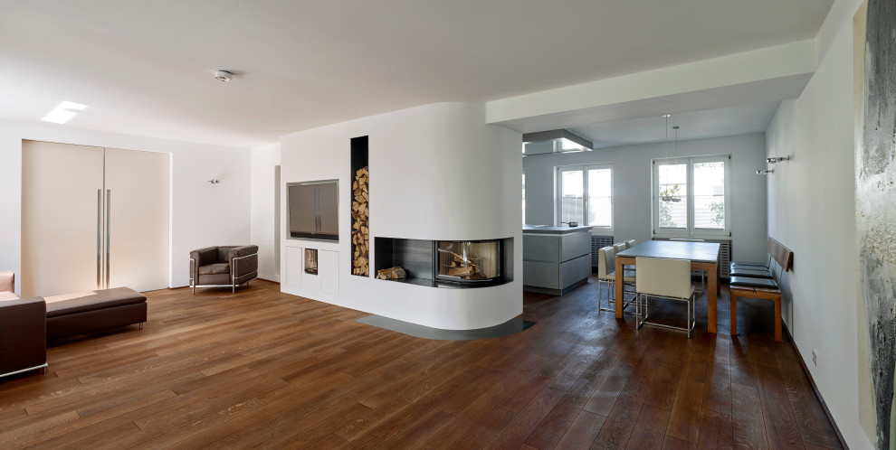 Стильный дизайн: гостиная комната среднего размера в стиле модернизм - последний тренд