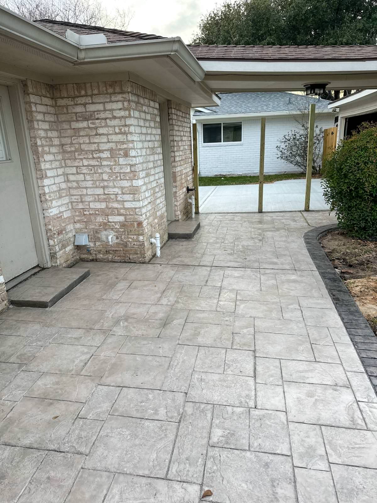 New driveway with sidewalks and stamped concrete!