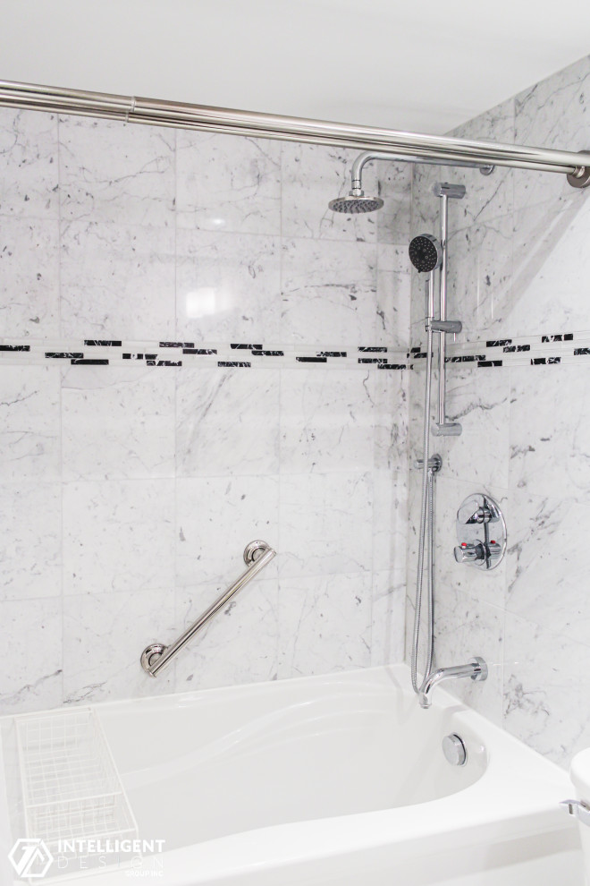 Inspiration for a mid-sized transitional master white tile and marble tile white floor and double-sink alcove bathtub remodel in Toronto with flat-panel cabinets, dark wood cabinets, white walls and a freestanding vanity