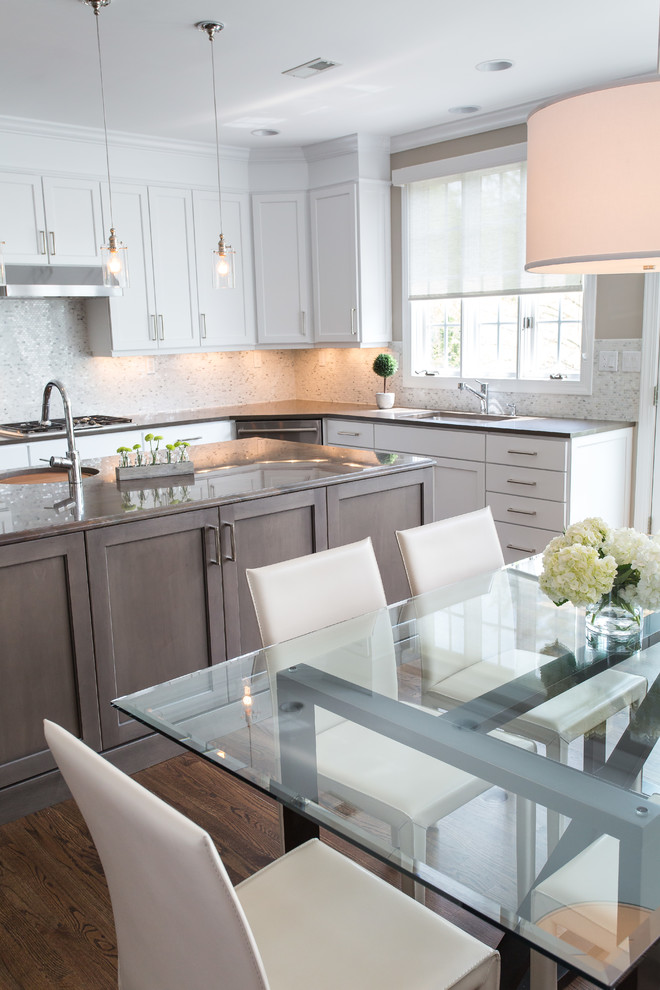 Large transitional u-shaped dark wood floor eat-in kitchen photo in DC Metro with an undermount sink, shaker cabinets, white cabinets, quartz countertops, beige backsplash, mosaic tile backsplash, stainless steel appliances and an island