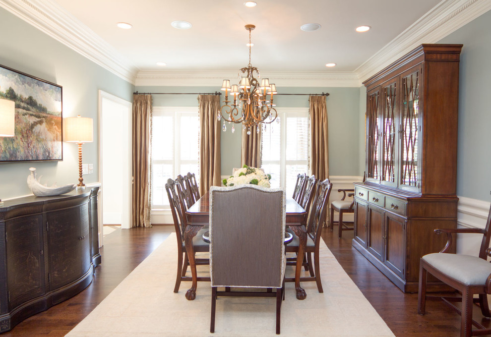 Mid-sized transitional separate dining room in Atlanta with blue walls, medium hardwood floors and no fireplace.