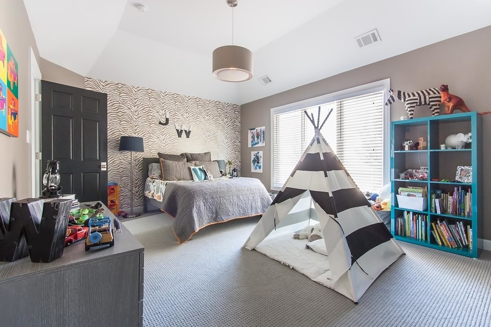 This is an example of a large traditional kids' bedroom for kids 4-10 years old and boys in Chicago with brown walls, carpet, brown floor, recessed and wallpaper.
