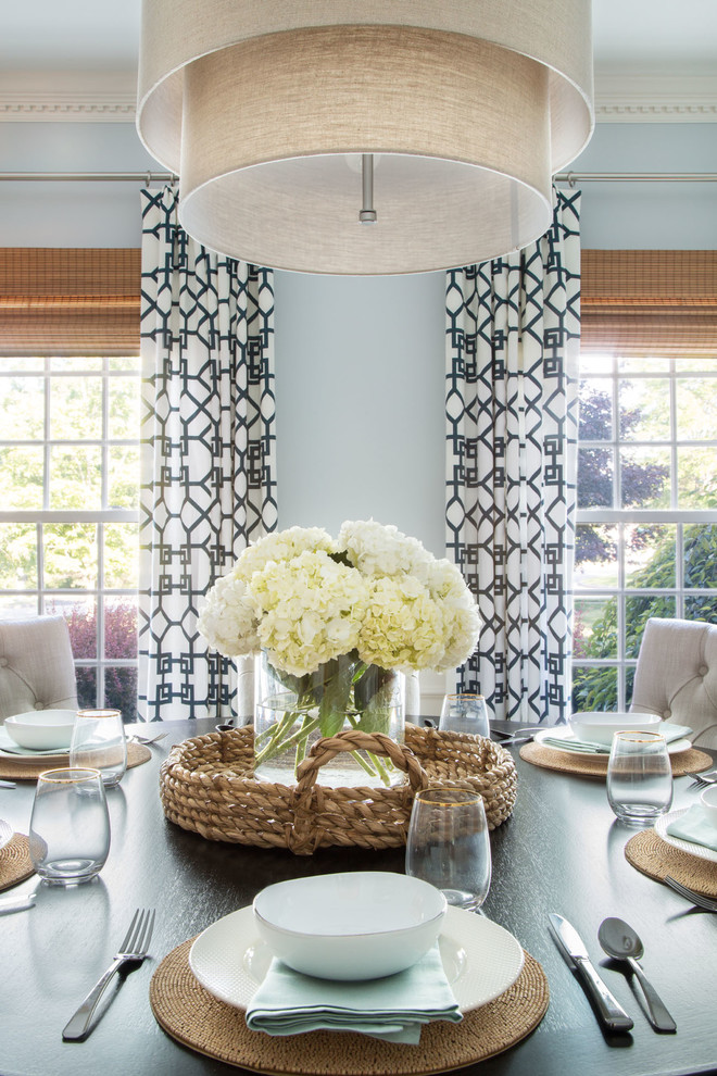 Dining room - transitional dining room idea in Boston with blue walls