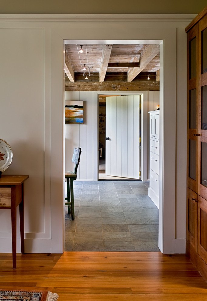 This is an example of a country hallway in Portland Maine with slate floors.