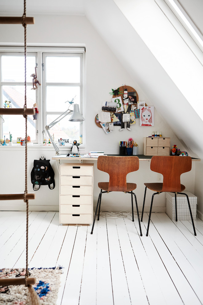 Design ideas for a mid-sized scandinavian gender-neutral kids' study room for kids 4-10 years old in Aarhus with white walls, painted wood floors and white floor.