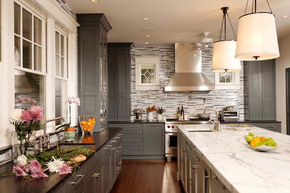 Design ideas for a traditional kitchen in Chicago with an undermount sink, shaker cabinets, grey cabinets, multi-coloured splashback, matchstick tile splashback and stainless steel appliances.